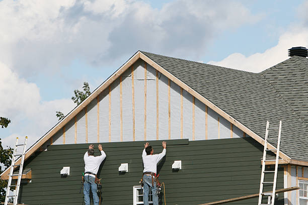Professional Vinyl Siding technician working in Auburn, NY